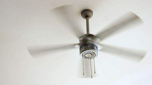 Low angle view of ceiling fan