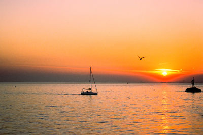 Scenic view of sea at sunset