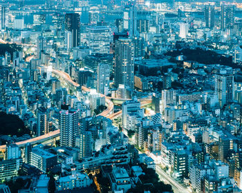 High angle view of illuminated cityscape