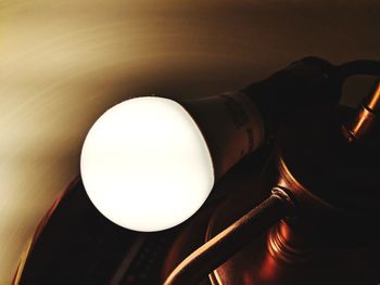 Close-up of illuminated light bulb