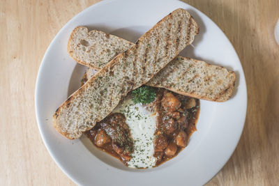 High angle view of bread in plate on table