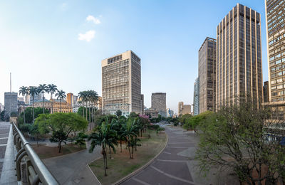 Buildings in city against sky