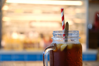 Close-up of drink in mason jar on table