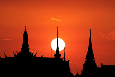 Silhouette temple against sky during sunset