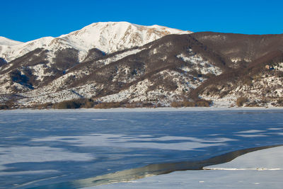 Frozen dam of campotosto on winter day