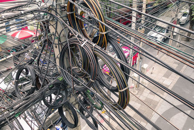High angle view of cables over road in city