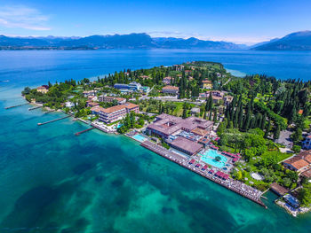 High angle view of residential district by sea