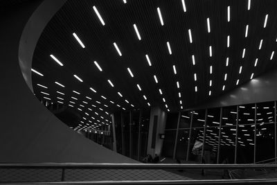 Low angle view of illuminated ceiling at railroad station