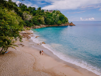 Scenic view of beach against sky