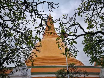 Low angle view of statue against trees