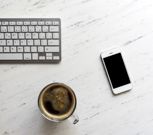 High angle view of coffee cup on table