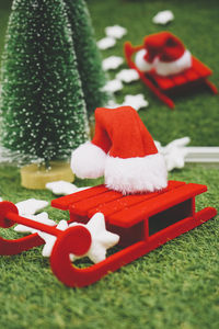 Close-up of christmas decorations on grass