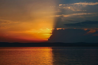 Scenic view of sunset over sea