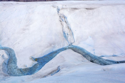 Meltwater stream on the surface of the grey glacier in torres del paine in patagonian, chile