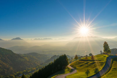 Scenic view of mountains against sky during sunset