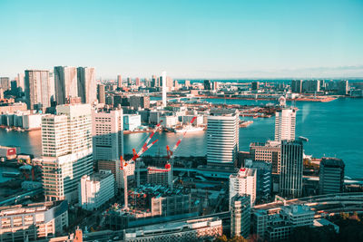 High angle view of buildings in city against sky