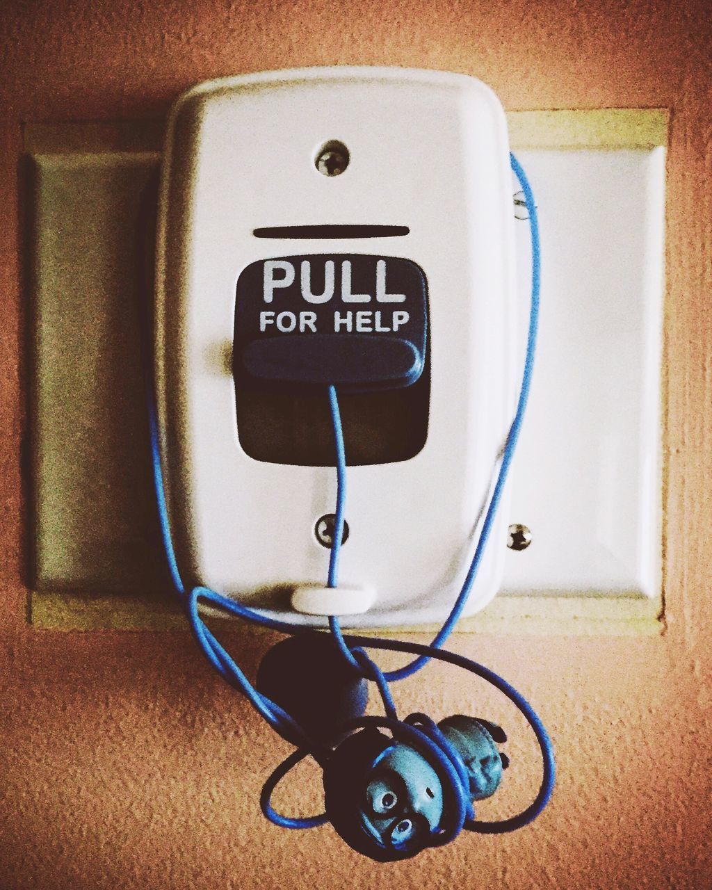 indoors, communication, technology, text, western script, number, close-up, connection, metal, no people, high angle view, telephone, still life, old-fashioned, wall - building feature, convenience, retro styled, table, door, wireless technology