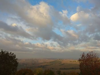 Scenic view of landscape against sky during sunset