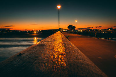 View of illuminated street at night