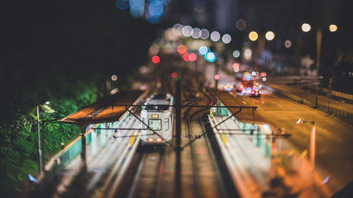 High angle view of illuminated street at night