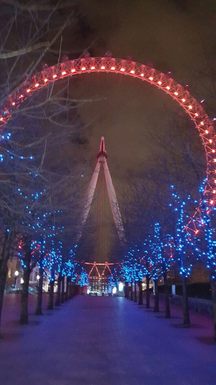 ILLUMINATED FERRIS WHEEL IN NIGHT