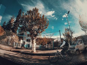 Bicycles on road against sky