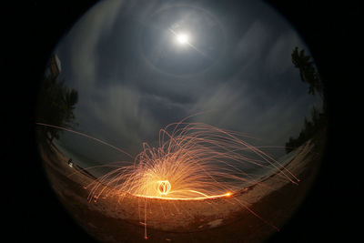 Fish-eye lens on wire wool on field