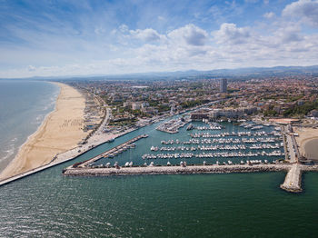 Panoramic view of rimini, its sea, its beaches and its port on the romagna riviera in post-pandemic 