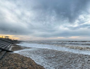 Scenic view of beach against sky