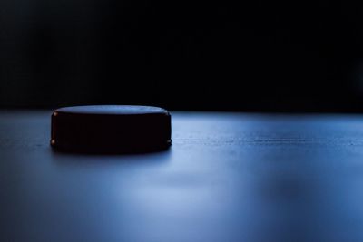 Close-up of bottle cap on table in room