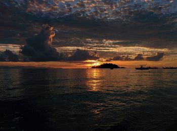 Scenic view of sea against sky during sunset