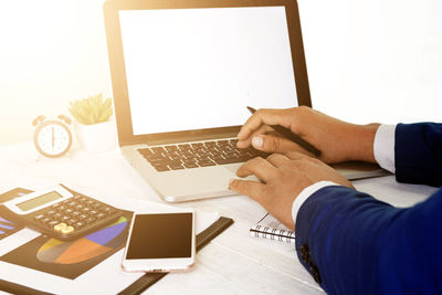 Man using laptop on table