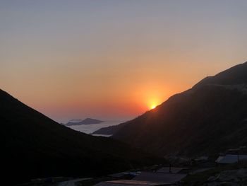 Scenic view of mountains against sky during sunset