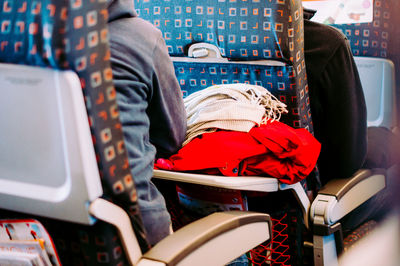 Low section of people on escalator