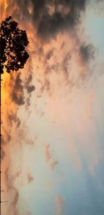 Low angle view of dramatic sky during sunset