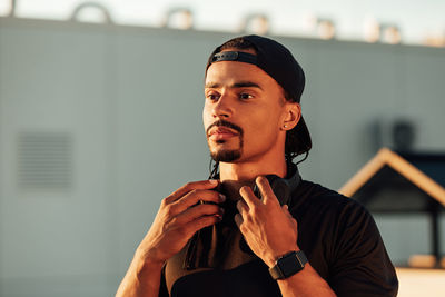 Young man smoking cigarette