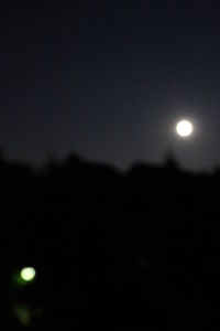 Scenic view of moon against sky at night