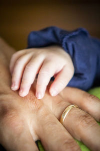 Midsection of baby hand