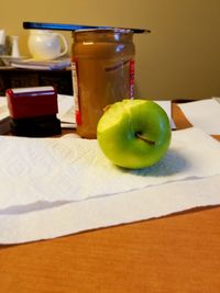 Green fruits on table