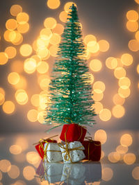 Close-up of illuminated christmas tree at night