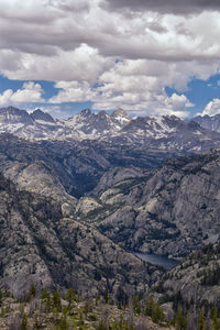 Aerial view of valley and mountains against sky