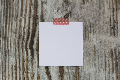 Close-up of text on white wall