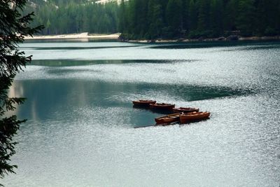 Boat moored on lake