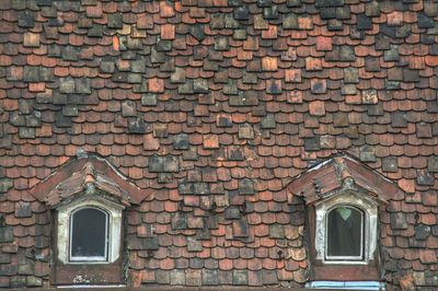 Low angle view of brick wall