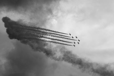 Low angle view of airplane in sky