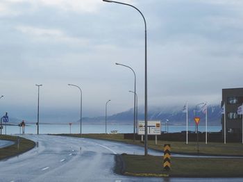 Road against cloudy sky