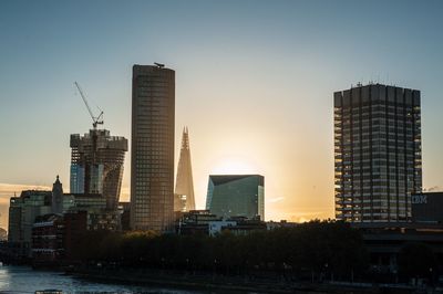 Skyscrapers in city against sky