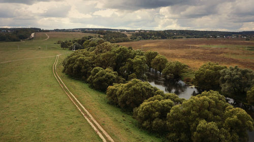 Road passing through field