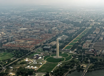 High angle view of illuminated cityscape against sky