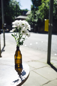Close-up of white flower vase on table